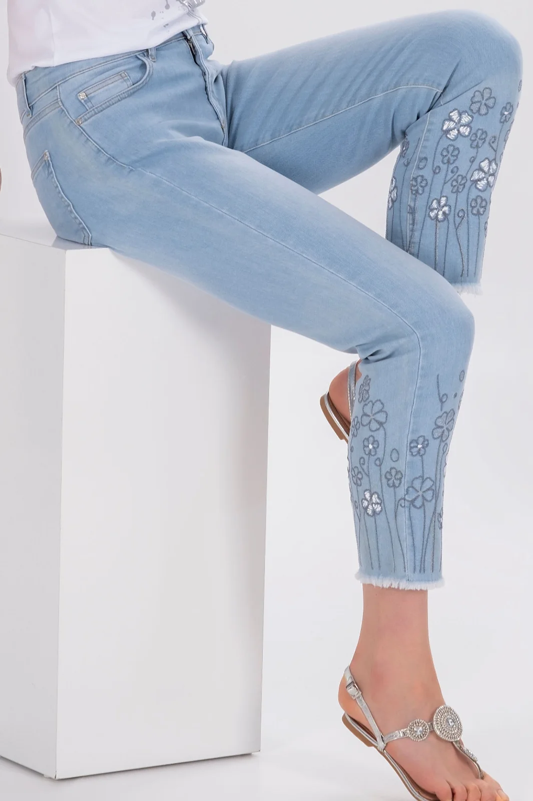 Dolcezza Light Wash Denim Jeans with Embroidered and Frayed Hem